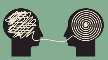 Silhouettes with tangled and spiral lines connecting minds.
