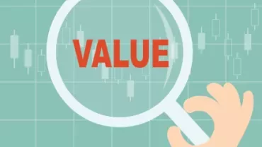 Loupe mettant l'accent sur le mot 'VALEUR' sur un fond de graphique boursier.
