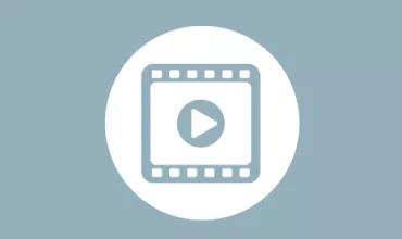 Icon of a triangular play button inside a film strip on a blue background.